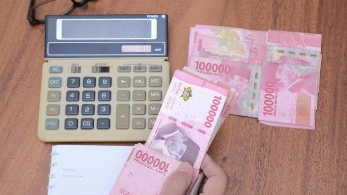 ILUSTRASI Uang Rupiah.