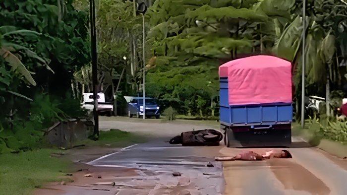 KECELAKAAN - Tampak kecelakaan di jalan sepi Tilamuta, Kabupaten Boalemo, Gorontalo. Pengendara motor dilindas ban truck.