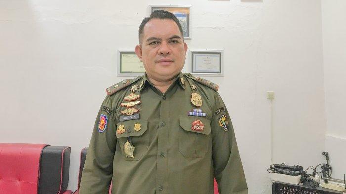 PASANGAN BUKAN MUHRIM -- Kasatpol PP, Mulky Datau saat ditemui TribunGorontalo.com, Senin (26/5/2025). Mulky menjelaskan pasangan bukan muhrim dapat dipidana.