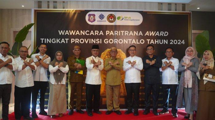 PEMKAB BONE BOLANGO--Bupati Bone Bolango, Ismet Mile ikuti wawancara pelaksanaan penganugerahan paritrana award tahun penilaian 2024, di Yulia Hotel, Senin (30/6/2025). Foto: Onal/Prokopim