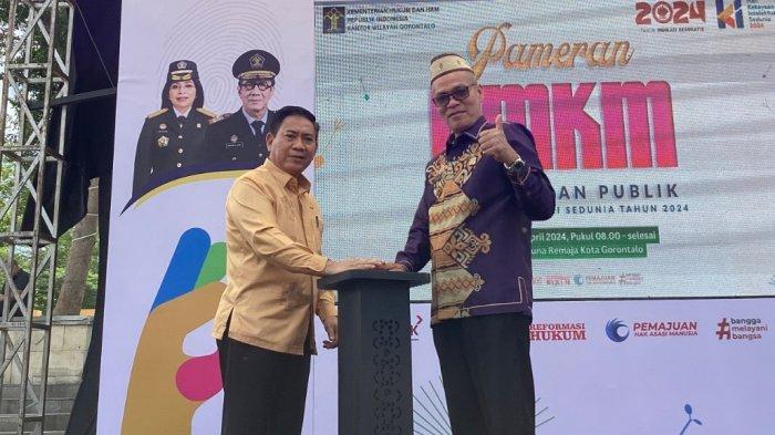 Kepala Kemenkumham Kanwil Gorontalo Pagar Butar Butar bersama Asisten I Bidang Pemerintahan dan Kesra Setda Provinsi Gorontalo Sukri Botutihe