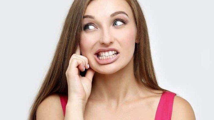 ilustrasi seseorang yang memiliki kebiasaan menggertakkan gigi atau bruxism