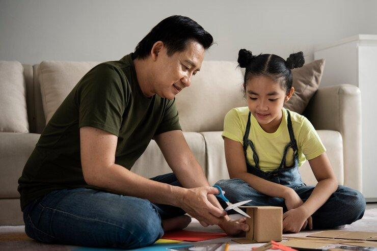 ilustrasi seorang anak yang sedang membuat parkarya dengan ayah