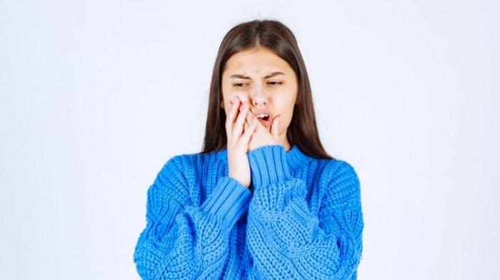 ilustrasi seseorang yang mengalami gigi berlubang, berikut ini cara mencegah gigi berlubang