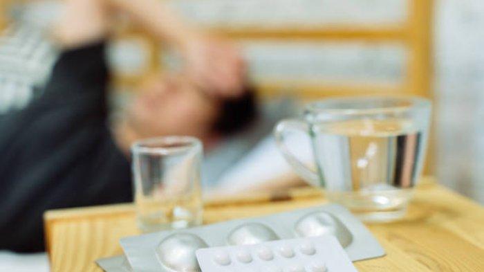 ilustrasi konsumsi obat flu atau obat influenza