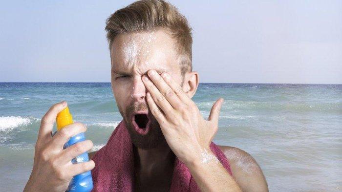 Ilustrasi pria yang menggunakan sunscreen