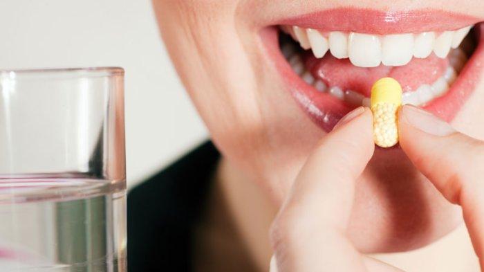 ilustrasi konsumsi obat penurun kadar asam urat