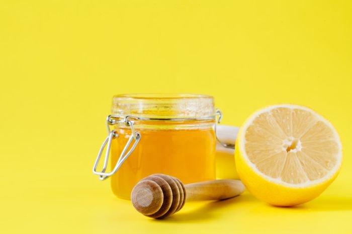 ilustrasi madu dan lemon yang bermanfaat untuk kesehatan kulit