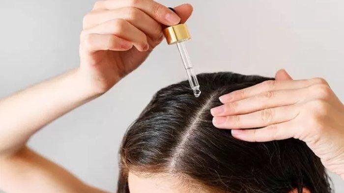 Ilustrasi penggunaan minyak rambut dapat menjaga rambut dari kerusakan, berikut manfaat lainnya