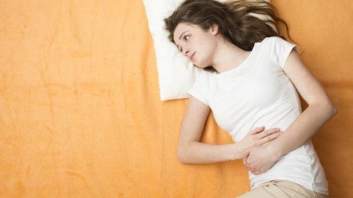 ilustrasi seorang wnaita yang mengalami ketidakseimbangan hormon saat menstruasi