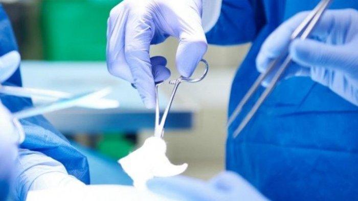 ilustrasi dokter yang sedang melakukan tindakan operasi