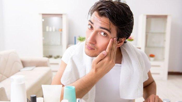 ilustrasi pria yang menggunakan pelembap atau moisturizer