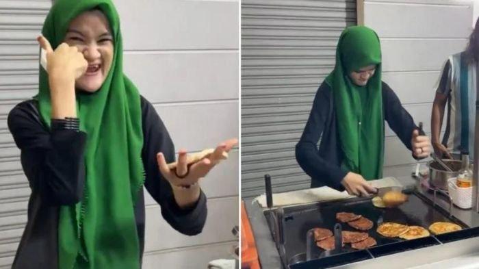 Wanita disabilitas bekerja keras sebagai penjual burger
