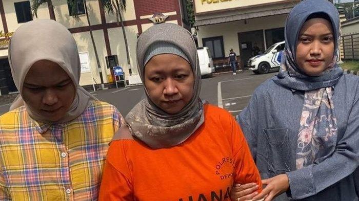 Meita Irianty (tengah) saat dihadirkan dalam jumpa pers di Polres Metro Depok, Kamis (1/8/2024). Meita menjadi tersangka kasus penganiayaan balita.