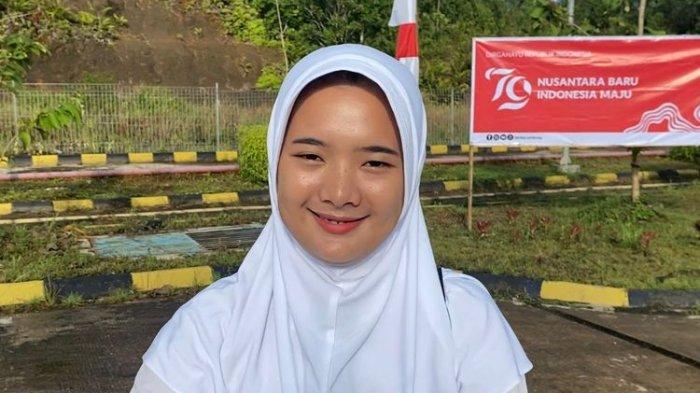 Norlichan Amoy (17), pelajar kelas 12 SMA Negeri 1 Jagoi Babang, Kabupaten Bengkayang, Kalimantan Barat, yang tinggal di Serikin, Malaysia, Sabtu (17/8/2024).