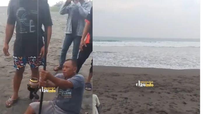 SELAMATKAN WISATAWAN - Seorang pemancing menyelamatkan wisatawan di Pantai Ketawang, Purworejo, Jawa Tengah, Kamis (10/4/2025), dengan menggunakan drone dan alat pancing.