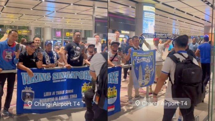 Rombongan tim Persib Bandung mendapatkan sambutan dari para Bobotoh di Singapura saat tiba di Bandara Internasional Changi, Selasa (5/11/2024).