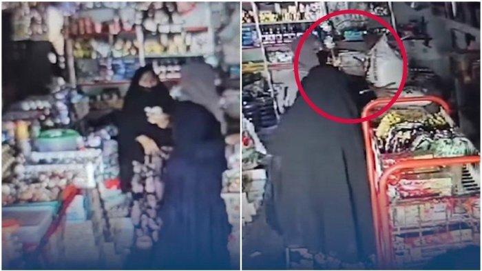 Sebuah rekaman CCTV memperlihatkan seorang emak-emak nekat mencuri beras.