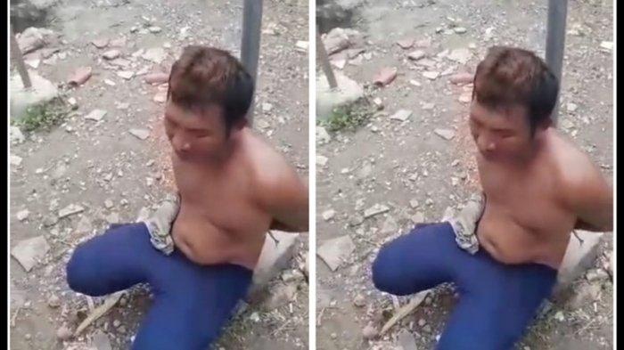 Pria pemulung yang diduga hendak mencuri di rumah warga, diikat di sebuah tiang.