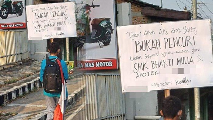 Sebuah foto memperlihatkan siswa SMK membawa poster untuk memprotes karena dituding sebagai maling saat magang beredar viral di media sosial.