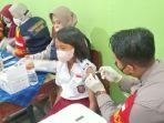 vaksinasi-covid-19-di-sdn-tenjolaya-1-2.jpg