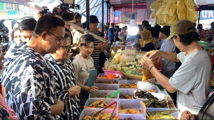 Paslon nomor urut 01, Anies-Muhaimin tengah berburu takjil di Bazar Takjil Ramadan Benhil, Tanah Abang, Jakarta Pusat, Rabu (20/3/2024).