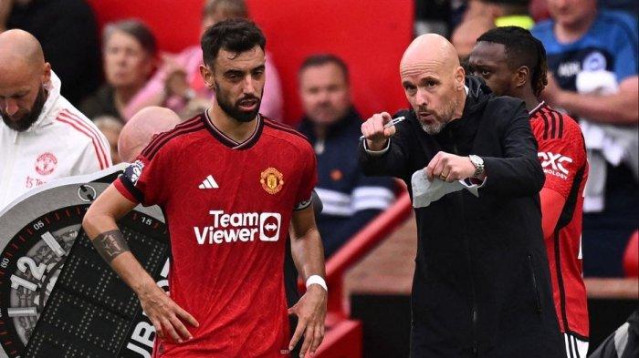 Kapten Manchester United Bruno Fernandes dan pelatih Erik Ten Hag.