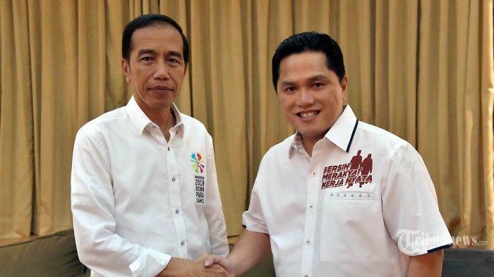 Presiden Joko Widodo bersalaman dengan pebisnis Erick Thohir (kanan) usai mengumumkan tim pemenangan kampanye di Rumah Cemara, Menteng, Jakarta Pusat, Jumat (7/9/2018).