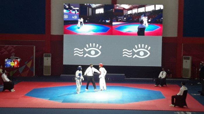 Pertandingan cabor Taekwondo PON Papua di GOR Politeknik Penerbangan Kayu Batu, Kota Jayapura, Minggu (3/10/2021).