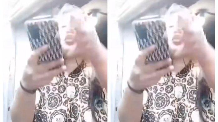 Tangkapan layar video viral wanta ngamuk maki kurir. Ia tolak bayar paket COD yang sudah dibuka.