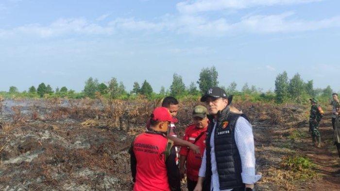 Ditreskrimsus Polda Jambi, Polres Muaro Jambi, BPBD Kabupaten Muaro Jambi, Babinsa Koramil, dan Kelompok Masyarakat Peduli Api pengecekan hotspot di perbatasan Provinsi Jambi - Sumatera Selatan pada Selasa (23/7/2024)