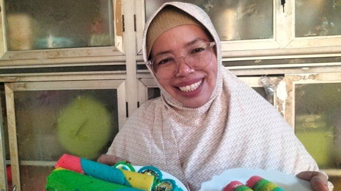 
Bolu Gulung Pelangi Mama Ina: Cerita Manis dari Dapur Kecil Jambi 

