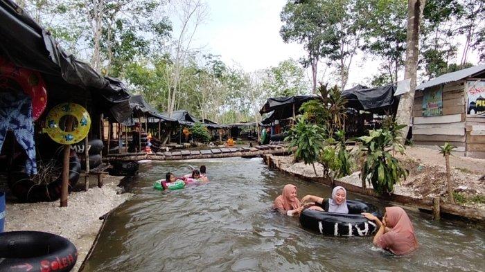 Wisata kali batu putih di Desa Pasar Singkut, Kecamatan Singkut, Kabupaten Sarolangun semakin populer di kalangan wisatawan.