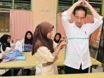 presiden-jokowi-tinjau-aktivitas-belajar-mengajar-di-smkn-4-kota-jambi.jpg