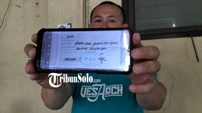 Kuitansi tanda bukti pembayaran program PSN yang diterima pedagang di Sragen, dari orang yang mengaku pegawai Dinas Kesehatan, Kamis (5/10/2023).
