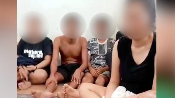 Tangkapan layar video amatir yang dikirim WNI korban sindikat penipuan online di Myanmar. Mereka dicambuk, disetrum, dan dipukul jika tidak mencapai 'target' pemasukan dari menipu orang secara daring.(@JERATKERJAPAKSA via BBC NEWS INDONESIA)