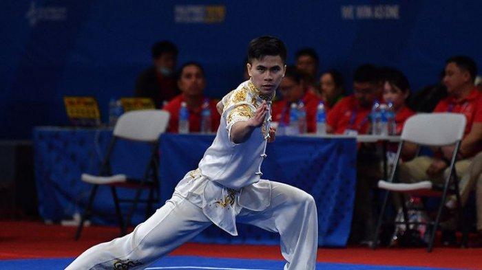 Atlet wushu putra Indonesia Edgar Xavier mengikuti final wushu taolu changquan putra SEA Games 2019 di World Trade Center, Manila, Filipina, Minggu (1/12/2019). Edgar gagal meraih medali berada di posisi keempat dengan skor 9,59.(ANTARA FOTO/Kompas.com)