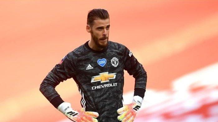 Ekspresi kiper Manchester United, David de Gea, saat timnya mengalami kekalahan dari Chelsea pada babak semifinal Piala FA, Minggu (19/7/2020) waktu setempat.