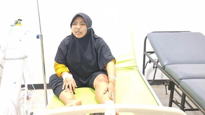 Nor Erna Rochmawati (29), korb yang sekaligus ibunda dari Ahmad Aiman Nabil salah satu penumpang bus new Shantika yang selamat dari kecelakaan nahas tersebut.