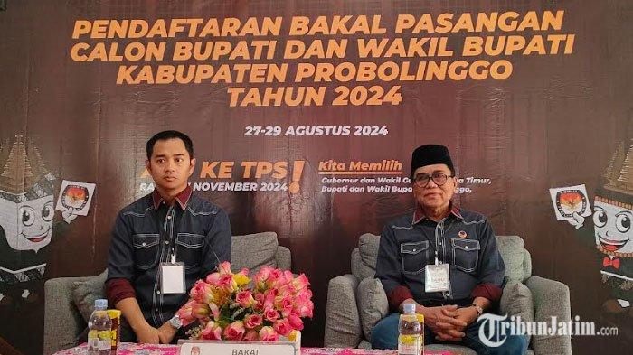 Bacabup-Bacawabup Zulmi-Rasit saat berada di kantor KPU Kabupaten Probolinggo untuk menyerahkan berkas pendaftaran. Artikel berjudul 'Usai Daftar ke KPU, Zulmi Kirim Pesan Sayang ke Rival Pilkada Probolinggo: Bukan Medan Perang'