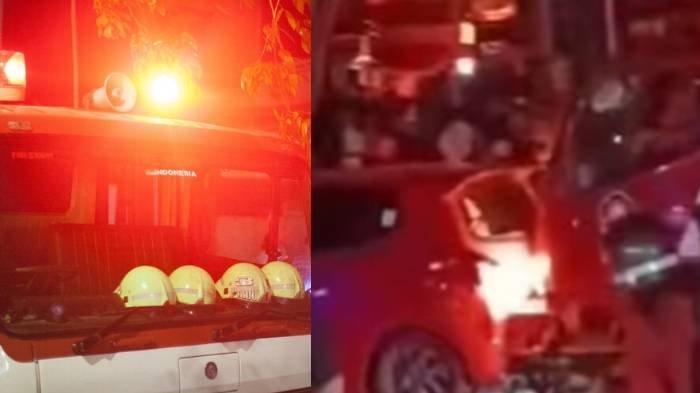 MOBIL DAMKAR SERUDUK KENDARAAN - Damkar Balikpapan seruduk mobil merah yang menghalangi jalan.