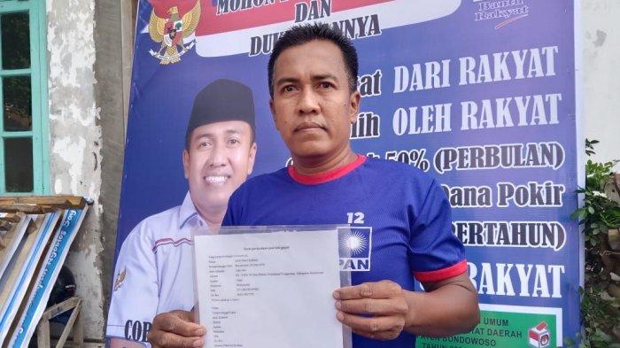Erfin Dewi Sudanto Caleg Bondowoso menunjukan surat pernyataan jual ginjal.