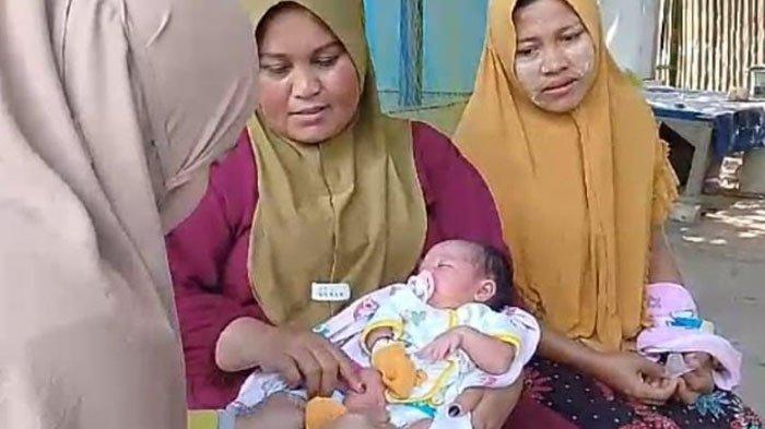Kondisi bayi yang terlahir dengan 24 jari, anak dari pasangan warga Desa Sejati, Kecamatan Camplong, Kabupaten Sampang, Madura, Rabu (31/1/2024).