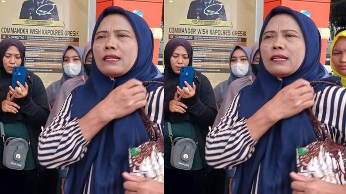 Nikmaroh (kanan) bersama beberapa orang yang merasa menjadi korban melaporkan pengelola arisan yang diikuti di Mapolres Gresik, Jawa Timur, Senin (4/11/2024).