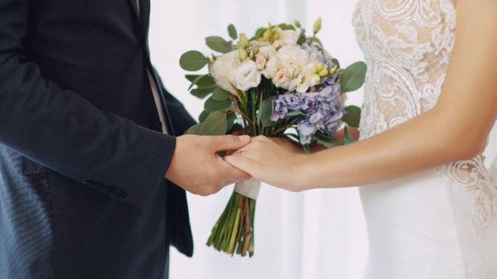 BATAL MENIKAH - Foto ilustrasi pernikahan untuk berita pasangan di Thailand batal menikah dan pengantin wanita rugi Rp 243 juta. Calon suami diketahui tak datang di hari pernikahan.