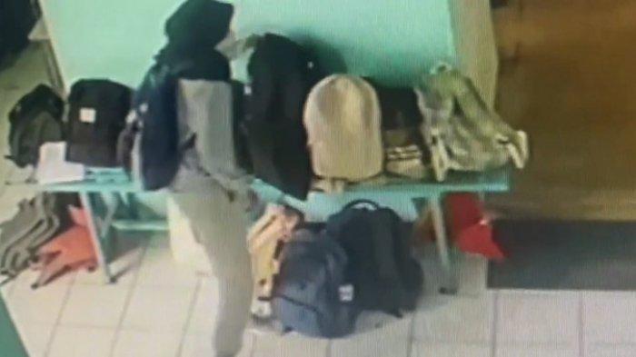 Potongan video CCTV perempuan berjilbab yang mencuri di sekolah