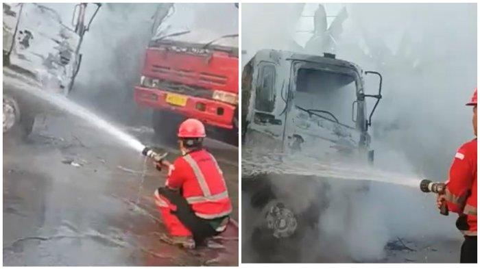 Petugas Damkar di Gresik berjibaku memadamkan api yang melahap bodi truk