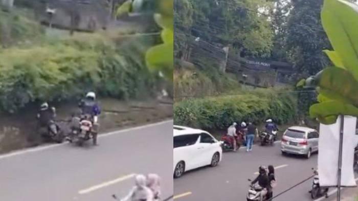 PATWAL PEPET PEMOTOR - Tangkapan layar video aksi seorang petugas patwal tendang pengendara motor hingga terjatuh ke selokan di Puncak Bogor, beredar viral di media sosial, Jumat (14/3/2025). --- Begini nasib Aipda H, oknum anggota patroli dan pengawalan (patwal) yang viral ketika mengawal mobil mewah Alphard di Puncak Bogor, Jawa Barat.