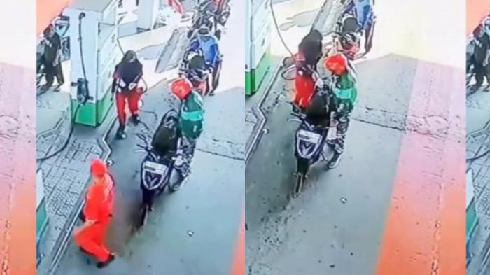 DRIVER OJOL VIRAL - Tangkapan layar video driver ojol di Jawa Barat lempar uang ke tanah saat isi bensin hingga membuat petugas SPBU kaget, Selasa (29/7/2025). Pihak Grab beri sanksi.