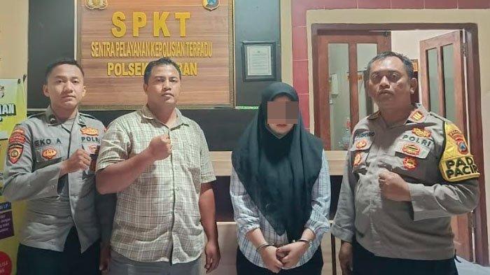 Terduga pelaku penipuan Revinda Putrisna asal Gresik diamankan  anggota Sat Reskrim Polres Lamongan, Jumat (2/8/2024).